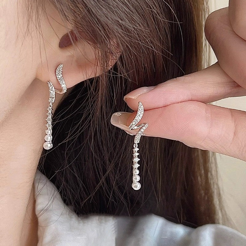 Wholesale Temperament long round face slim galaxy tassel earrings